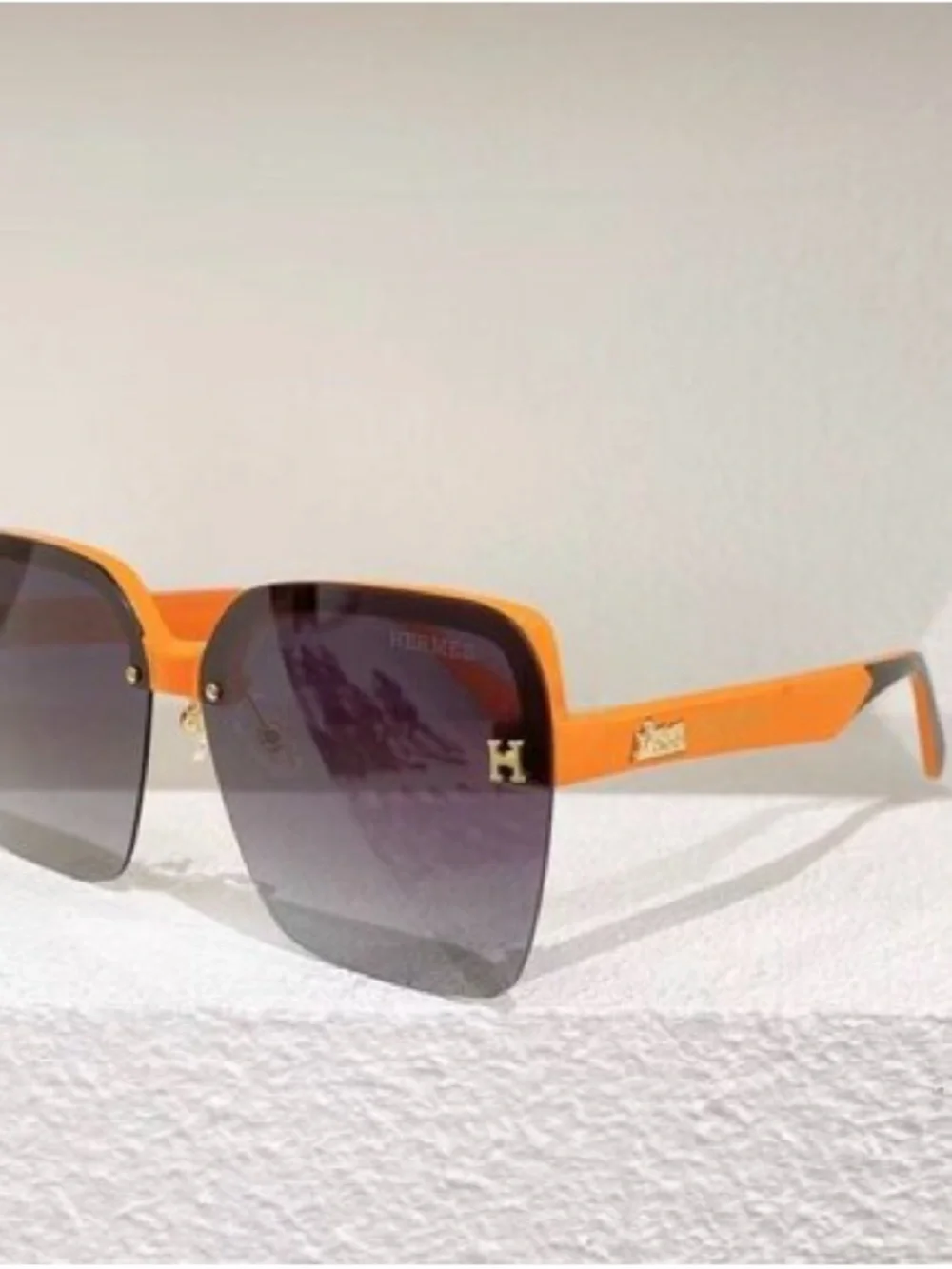 Hermes Men’s Sunglasses Orange Temples with Gray Lenses and Gold H Logo